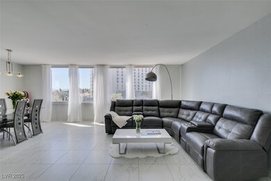 Living area with marble finish floor