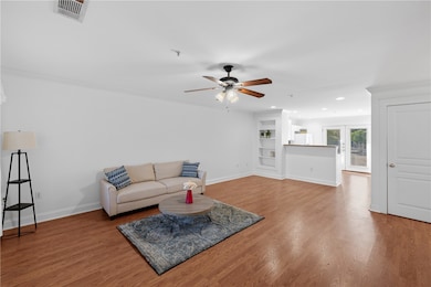 Living area. featuring open plan to kitchen and di