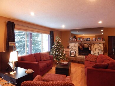 Living Room With Wood Burning Fireplace