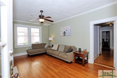 LIVING ROOM LOOKING DOWN HALLWAY.