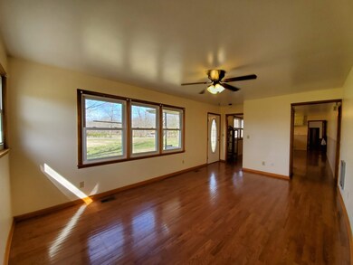 Another view of the Living Room with a pretty view and tons of natural light.