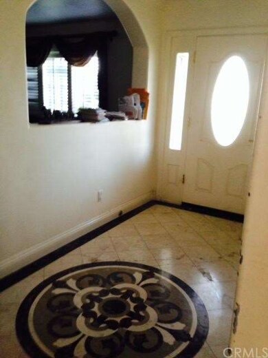 Stone entry floor with custom medallion