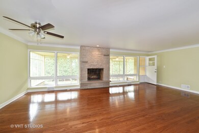Light Filled Living Room with Gleaming Hardwood Fl