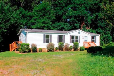 1300+ square foot doublewide on .73 acres. Storage
