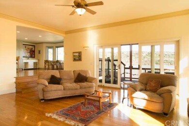 Living Room to Kitchen with Lake View