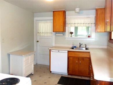 Compact kitchen with all the appliances, and a sur