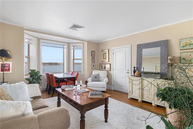 Living room with stunning scenic view of the bay.