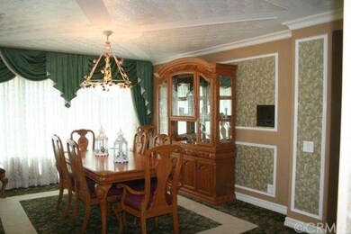 Formal living room, custom ceiling texture, crown 