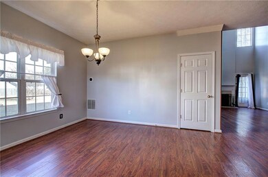 Dining room with a chandelier and LVP floors