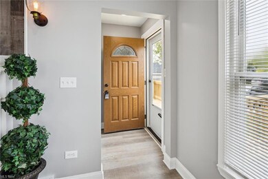 View of wood floored foyer entrance