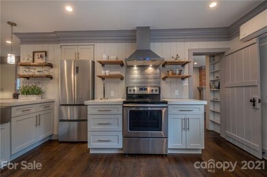Beautifully designed kitchen with smooth cooktop a