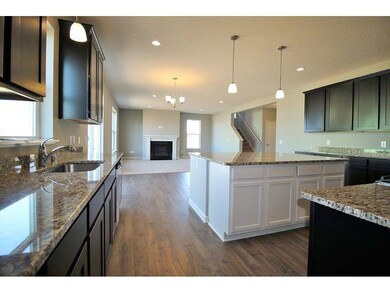 The expansive kitchen area transitions seamlessly 