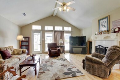 Spacious den with fireplace