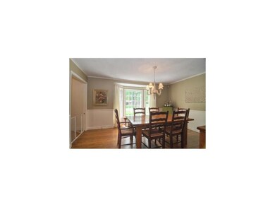 A second bay window adorns the formal Dining Room 