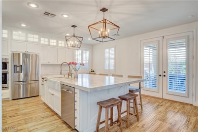 Kitchen featuring appliances with stainless steel
