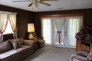 The den, with a door to the covered patio