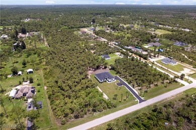 Aerial view of property's location with a heavily