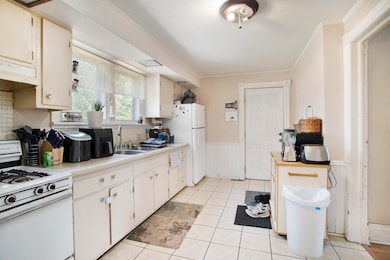 009_410_bidwell_st_albion_mi_49224_14_of