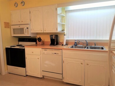 includes range/oven, refrigerator, dishwasher and 