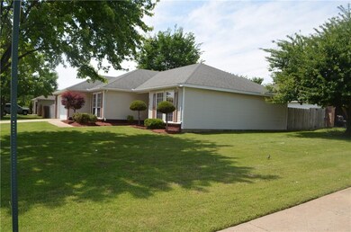 Lovely landscaping on this corner lot.