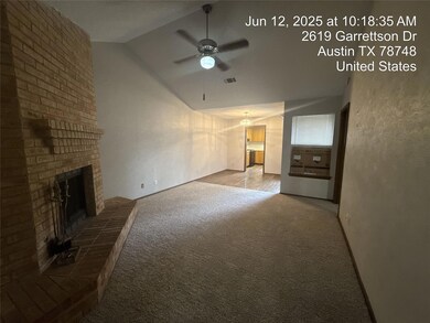 Unfurnished living room featuring vaulted ceiling