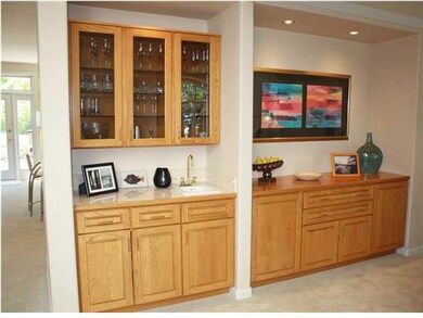 Buffet, wet and dry bar area with built in cabinet