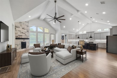 This home has 17 foot ceilings and a wall of windo