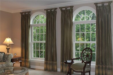 Living room - two large windows with palladium cir
