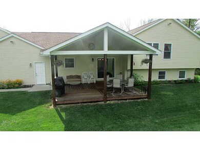 Exterior Back. Covered rear deck