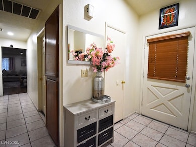 Entryway featuring tile patterned floors