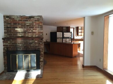Living Room with Kitchen in Background