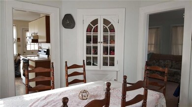 Dining room with view of kitchen and...
