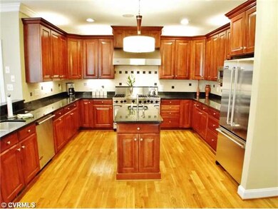 Kitchen - The gourmet kitchen has a Viking Range w