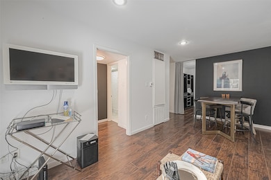 Gleaming laminate/wood flooring.