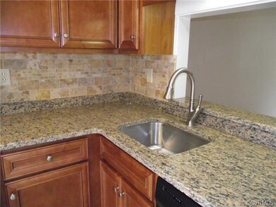 Beautiful granite counters, and subway tile backsp