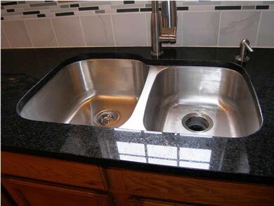 Closeup of the deeper submount sink and new faucet