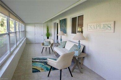 Enclosed lanai overlooking the water