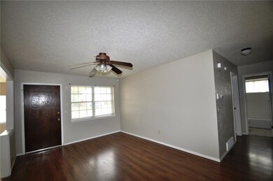 Open Living Room with Beautiful Wood Floors!