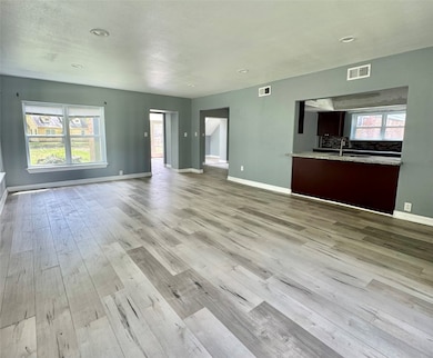 living room with view of kitchen