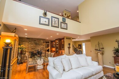 View of the double sided, stone fireplace and the 