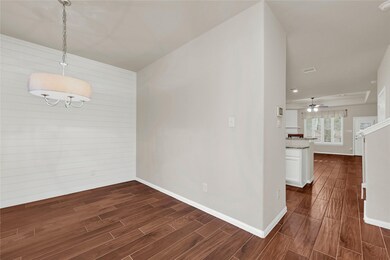 Rich maple wood look tile through out entire downs