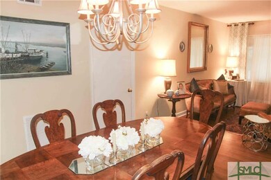 Formal dining room and formal living room.
