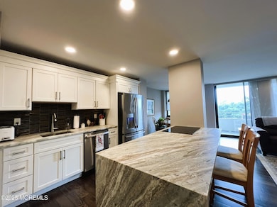 Channel Club Tower unit 507, Monmouth Beach, NJ 07750 - photo 4