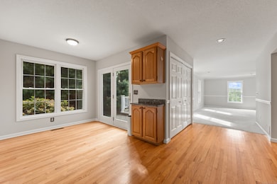 dining area of kitchen has glass door leading to deck , a great feature for outdoor entertaining