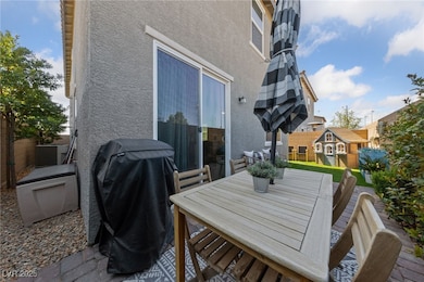 Deck with area for grilling, a patio, and outdoor dining space