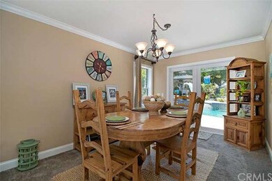 French doors in the formal dining room open to the