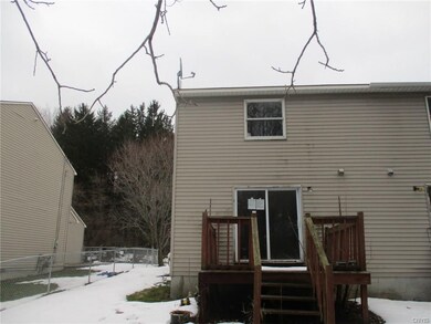 Back of the property with deck