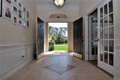 Grand double door entry with decorative medallion 