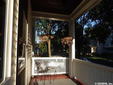 Other. The inviting front porch overlooks a beautiful tree lined street.