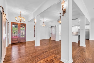 Large entryway with formal dining to the left.